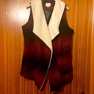Never worn black/red polyester/wool vest - faux lamb collar and polyester lining